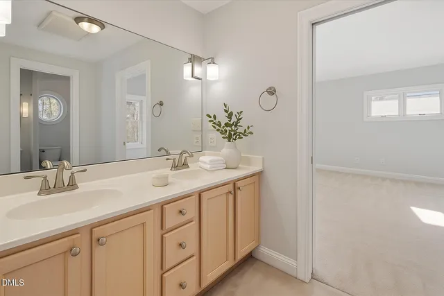 a bath tub sitting next to a bathroom