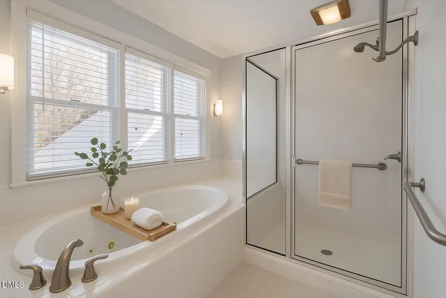 a view of a house with a yard and pathway