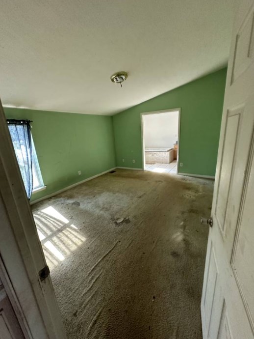 1561 Hickory Valley Road Sparta, TN 38583 - Photo 4 of 20 a view of empty room with window