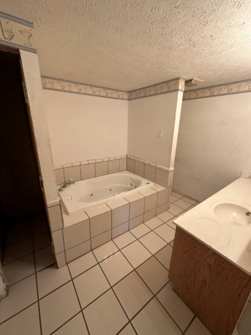 1561 Hickory Valley Road Sparta, TN 38583 - Photo 9 of 20 a bathroom with a sink and a shower