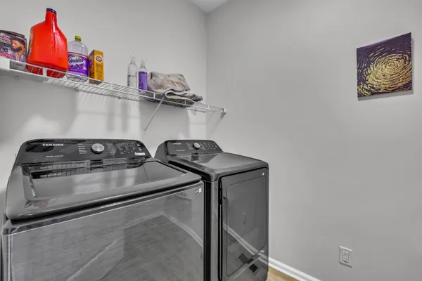 a utility room with dryer and washer