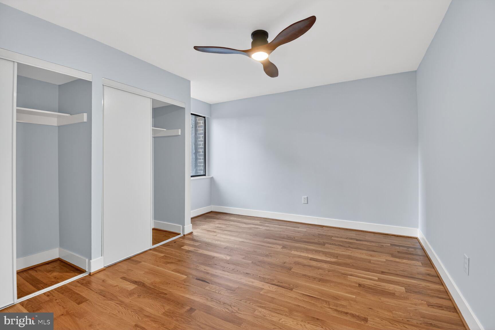 9802 Georgia Avenue, Unit 26202 Silver Spring, MD 20902 - Photo 28 of 31 wooden floor in an empty room
