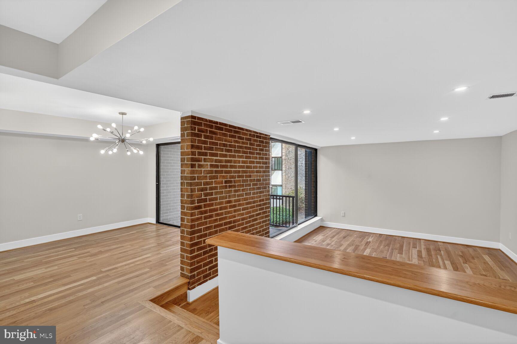 9802 Georgia Avenue, Unit 26202 Silver Spring, MD 20902 - Photo 4 of 31 a view of livingroom with hardwood floor and ceiling fan
