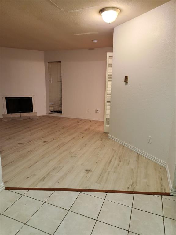 9813 Walnut Street, Unit 104 Dallas, TX 75243 - Photo 10 of 19 a view of empty room