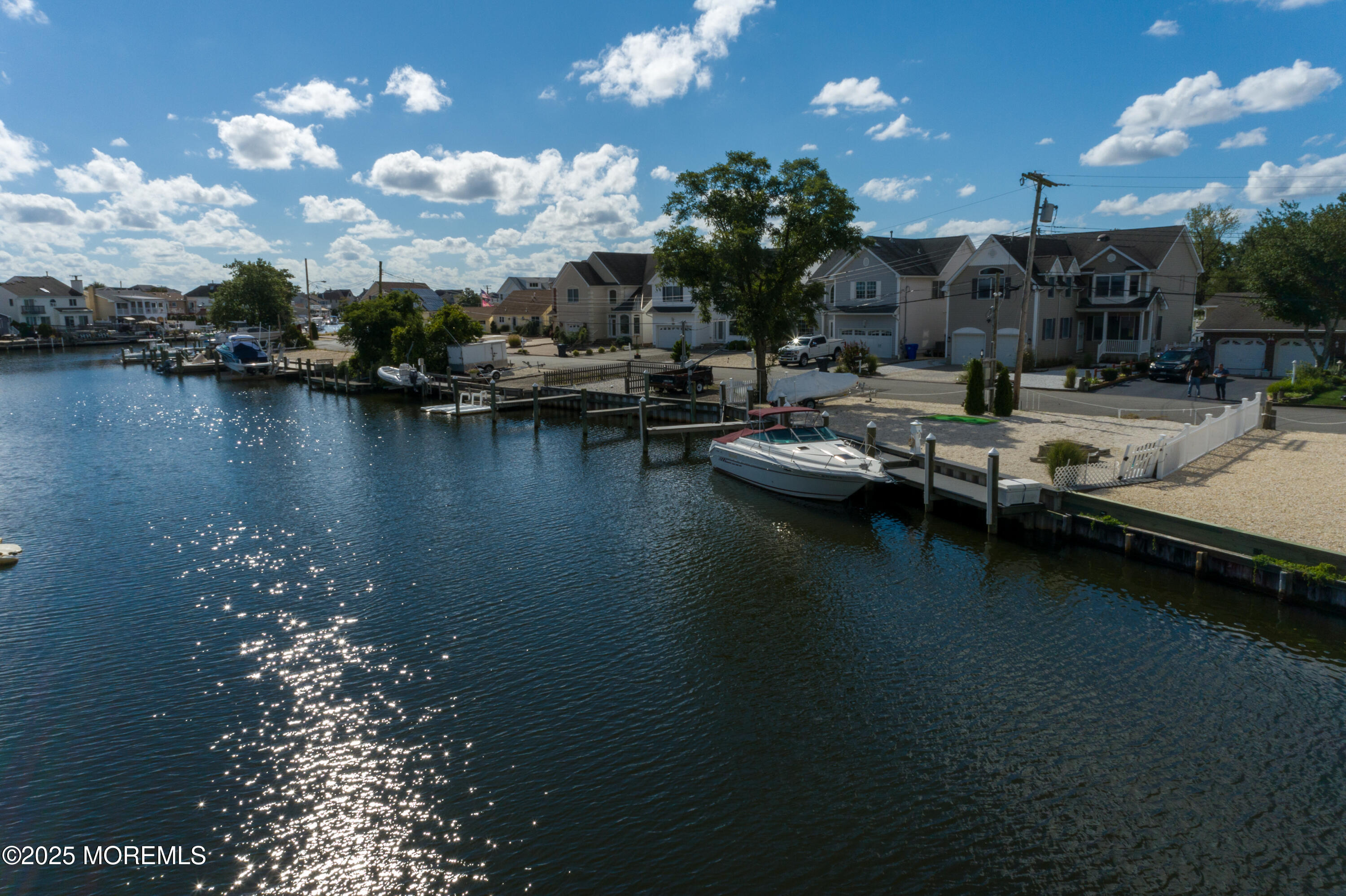 38-41 Topsail Road Brick, NJ 08723 - Photo 3 of 12 a view of a lake with boats