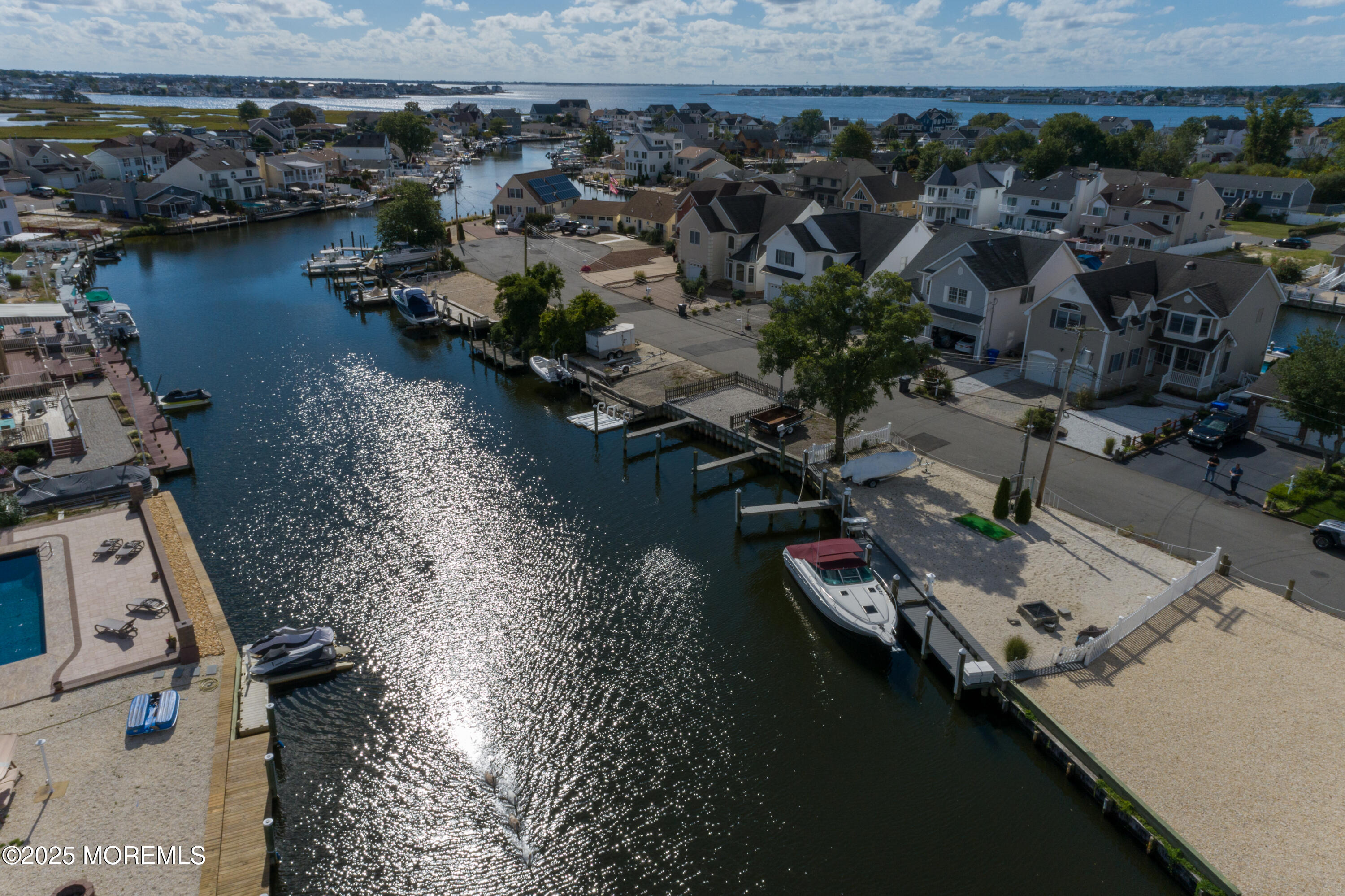 38-41 Topsail Road Brick, NJ 08723 - Photo 5 of 12 an aerial view of house with yard swimming pool and lake view