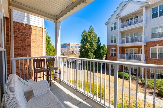 a balcony view with a couch