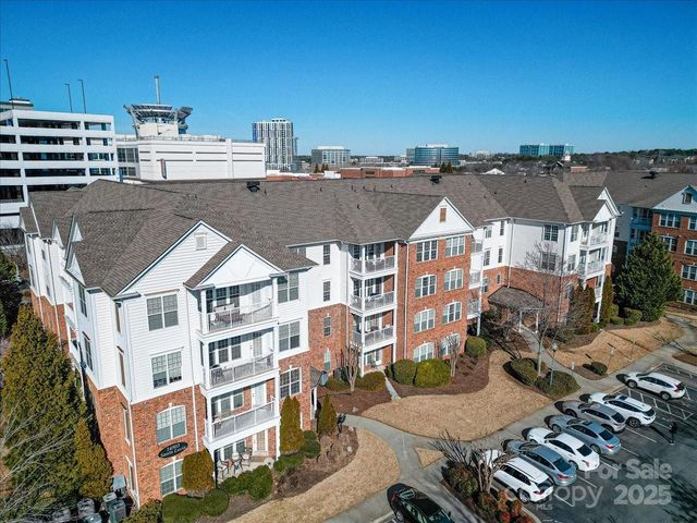 a front view of a building with glass windows