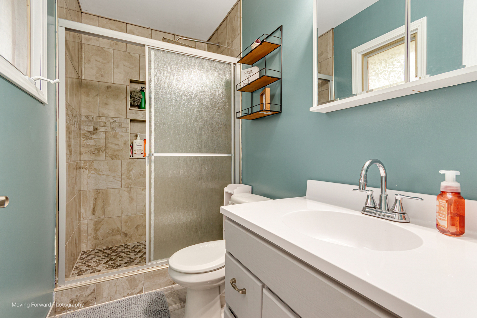 305 Prospect Avenue Dwight, IL 60420 - Photo 18 of 27 a bathroom with a sink toilet and shower