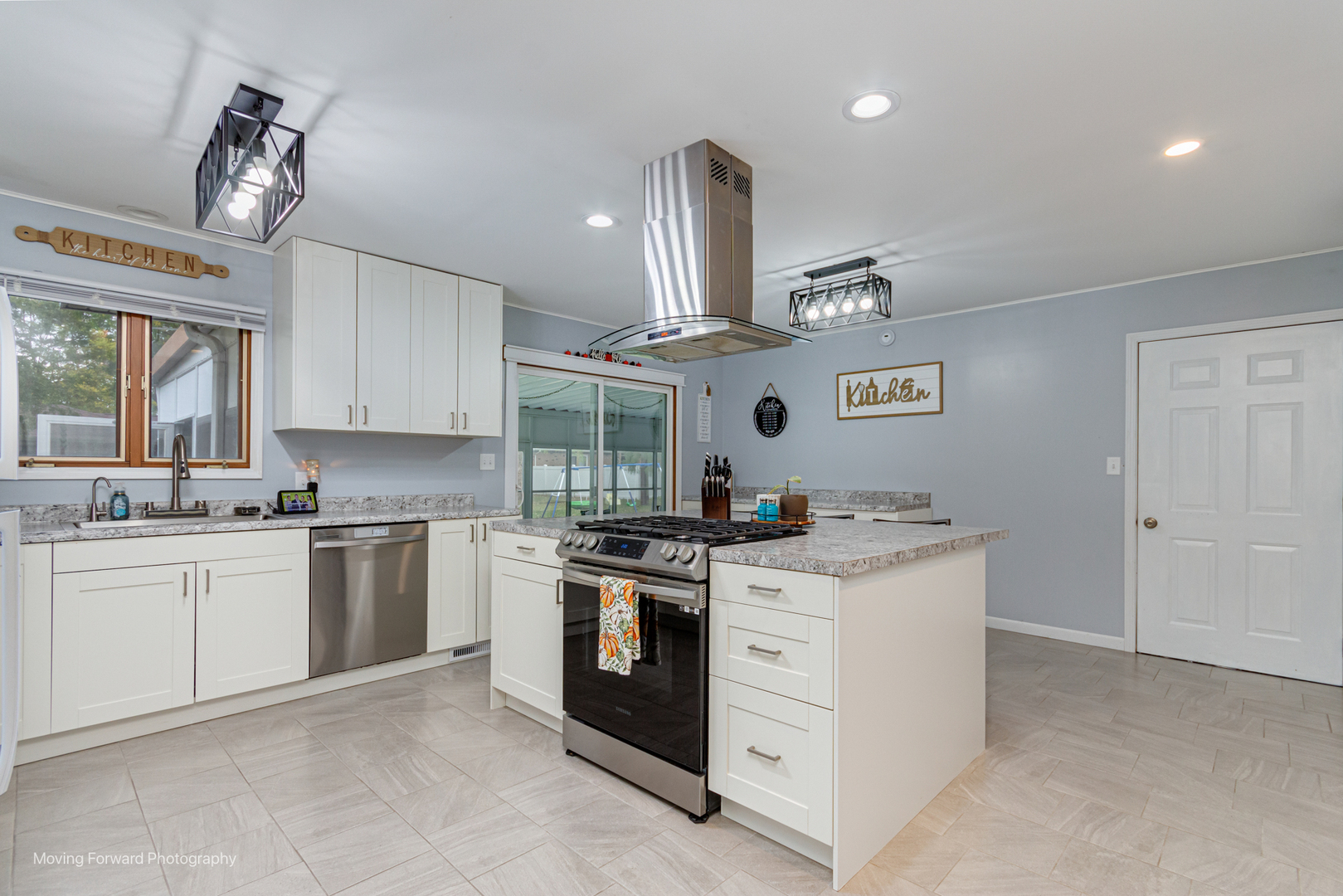 305 Prospect Avenue Dwight, IL 60420 - Photo 7 of 27 a kitchen with stainless steel appliances granite countertop a stove and a sink