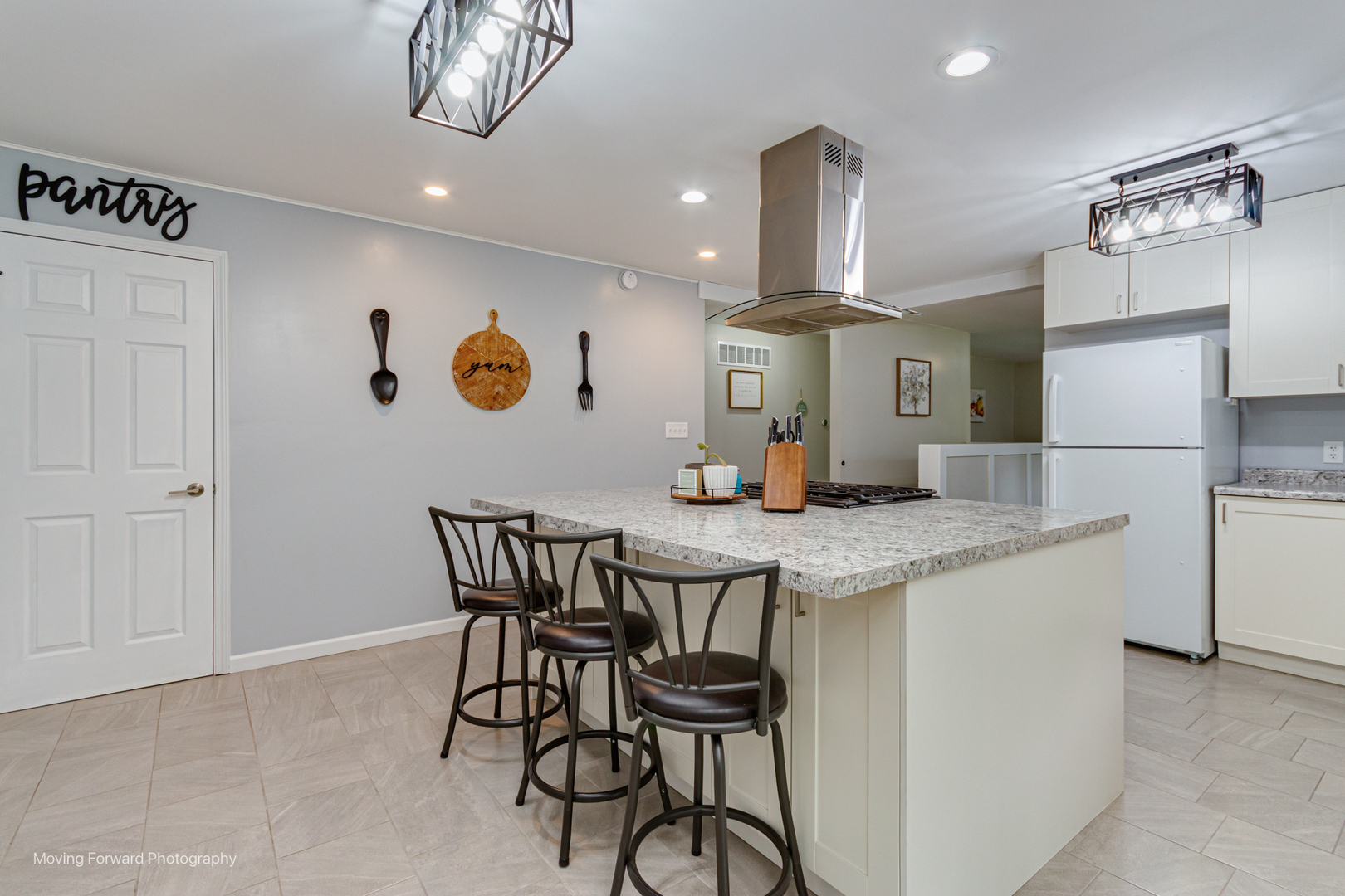 305 Prospect Avenue Dwight, IL 60420 - Photo 9 of 27 a view of a kitchen with granite countertop cabinets a sink and stainless steel appliances