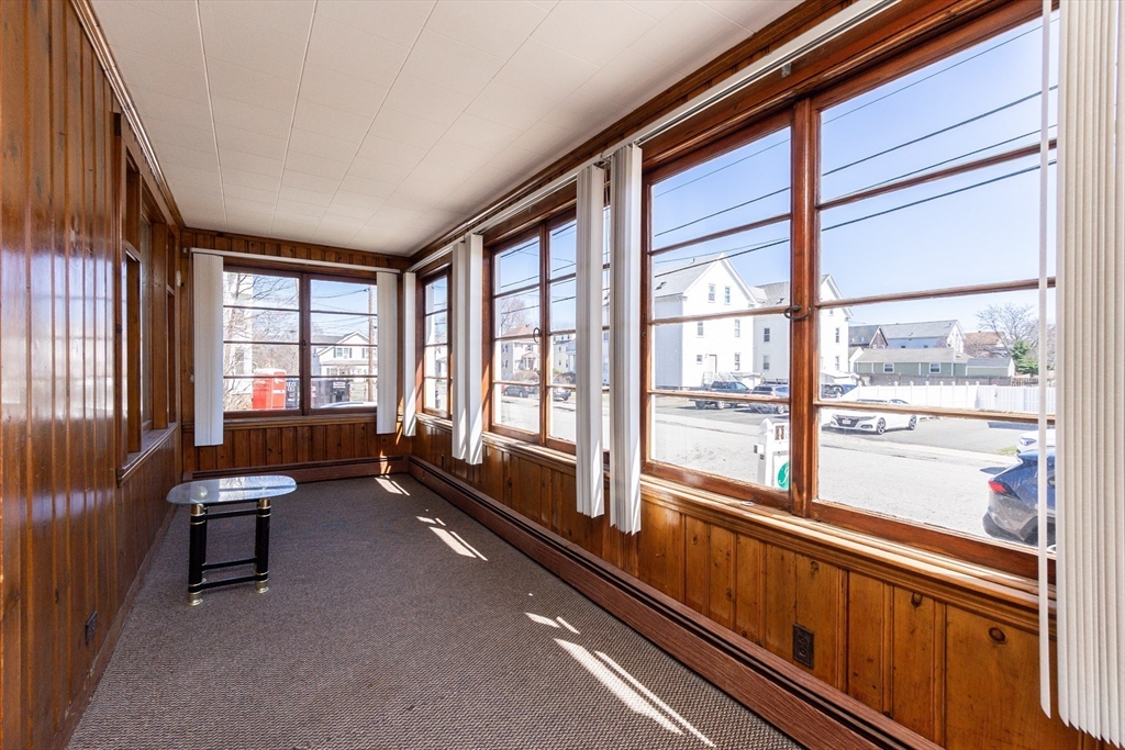 2 Sheldon Road Peabody, MA 01960 - Photo 2 of 42 a room with outdoor seating and a large window