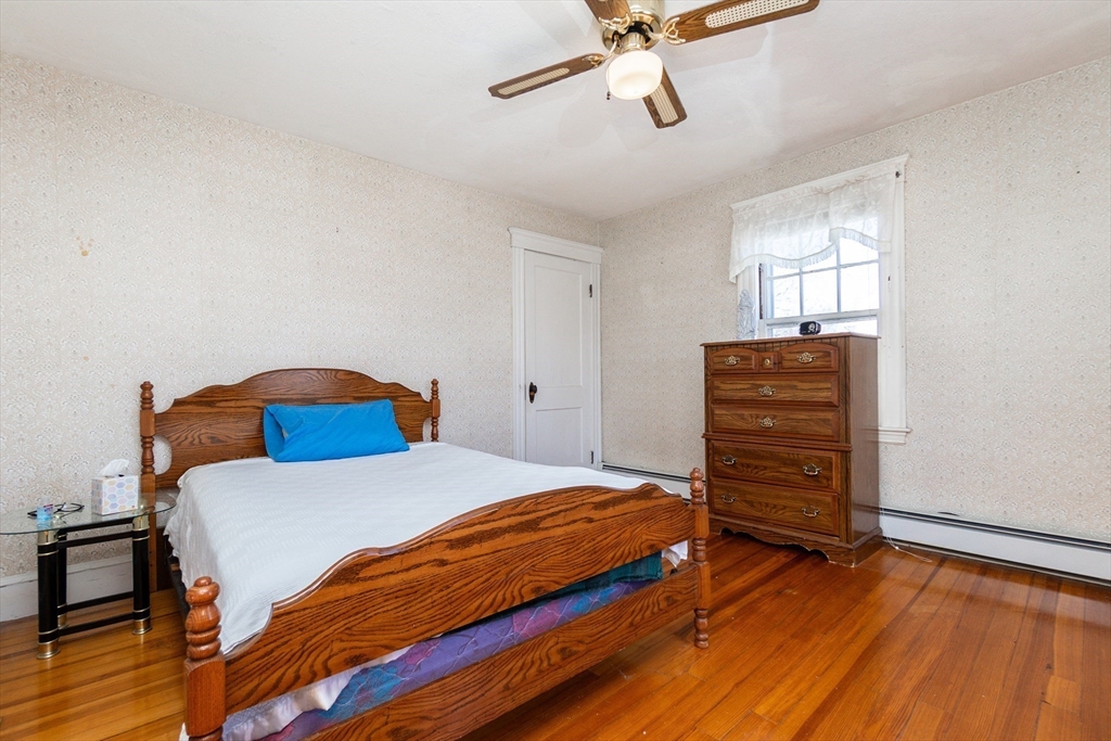 2 Sheldon Road Peabody, MA 01960 - Photo 22 of 42 a bedroom with a bed and a window