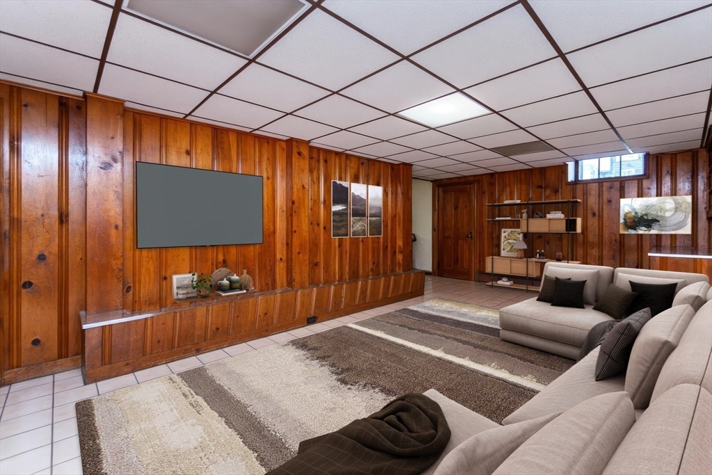 2 Sheldon Road Peabody, MA 01960 - Photo 26 of 42 a bed room with furniture and a flat screen tv