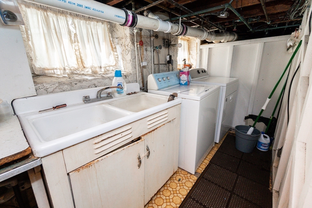 2 Sheldon Road Peabody, MA 01960 - Photo 32 of 42 a utility room with dryer and washer