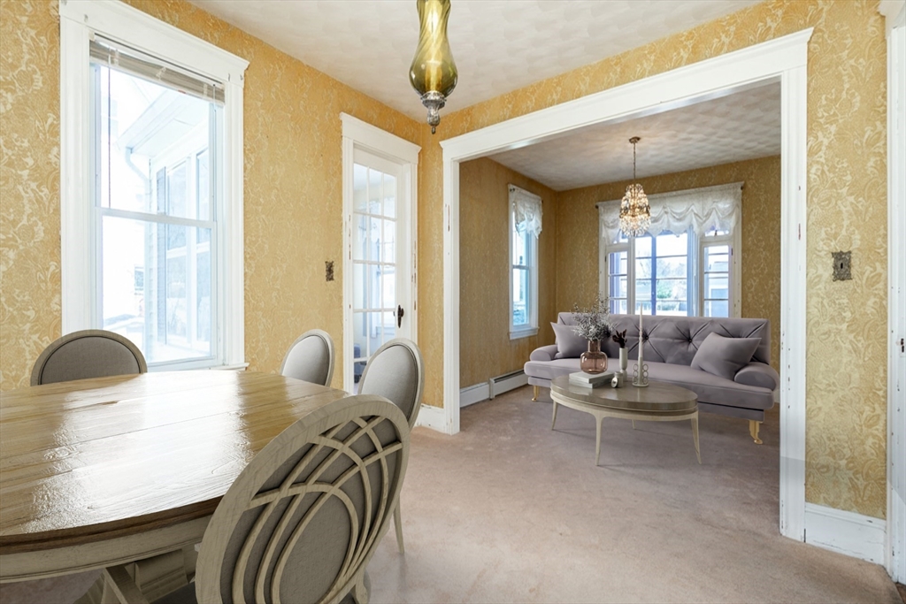 2 Sheldon Road Peabody, MA 01960 - Photo 8 of 42 a living room with furniture and a large window