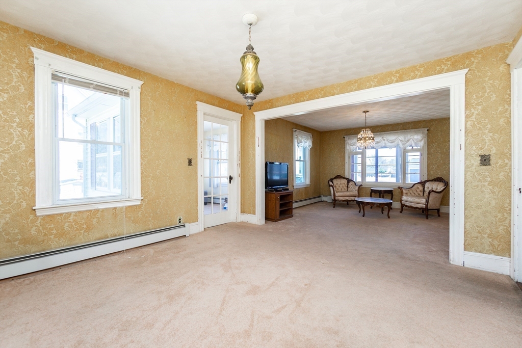 2 Sheldon Road Peabody, MA 01960 - Photo 9 of 42 a view of a livingroom with a window and furniture
