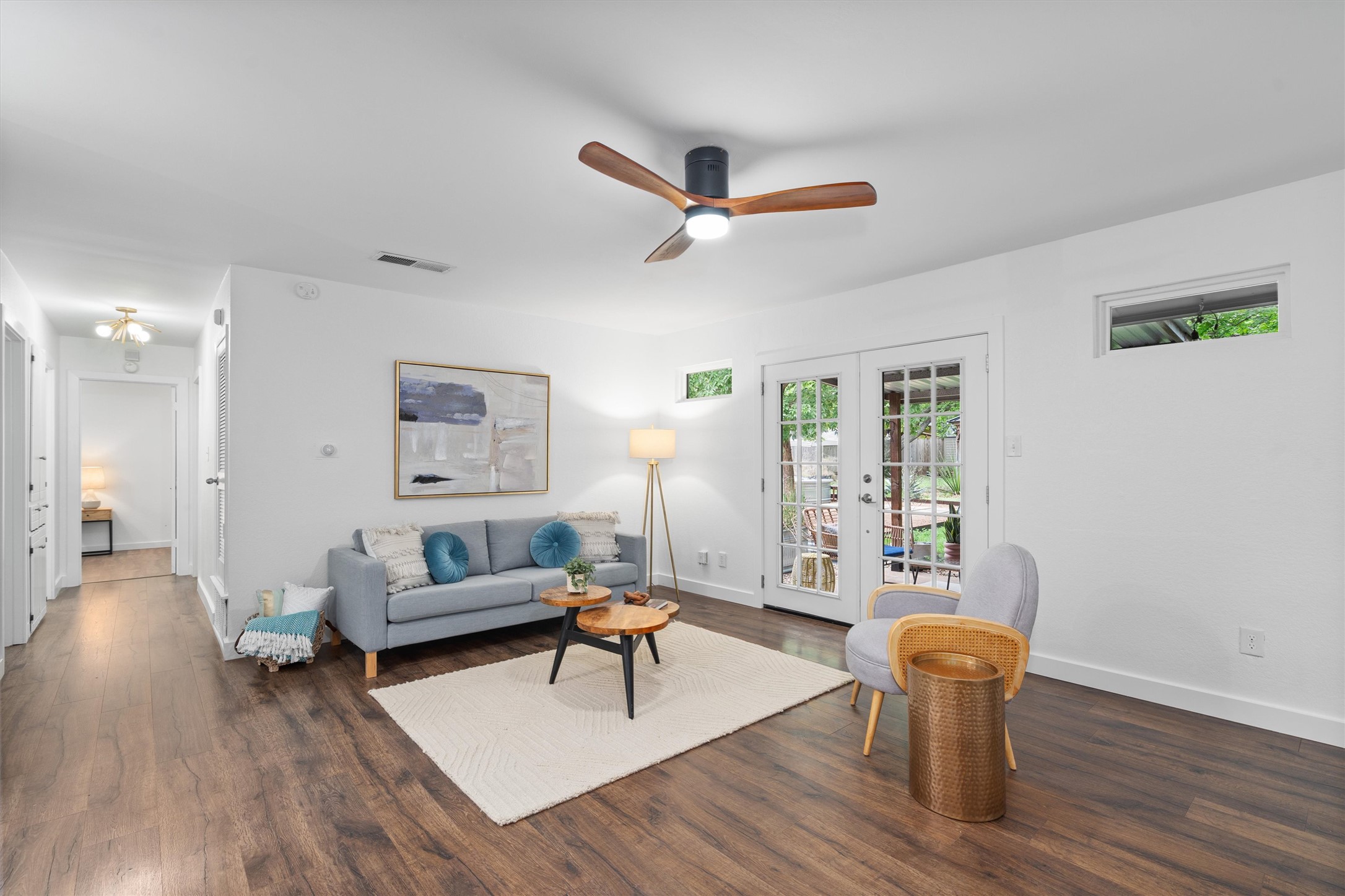 8436 Bangor Bend Austin, TX 78758 - Photo 8 of 29 Clean lines, warm floors, and clerestory windows give this room a fresh mid-century feel without trying too hard.