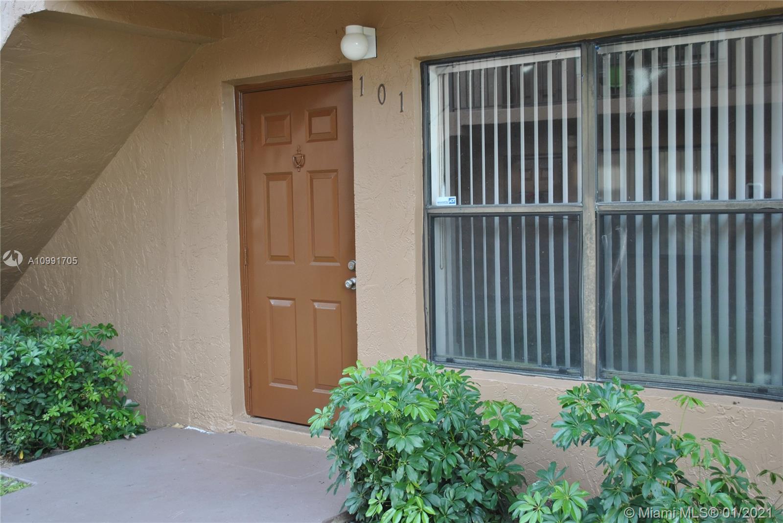 10047 Winding Lake Road, Unit 101 Sunrise, FL 33351 - Photo 1 of 14