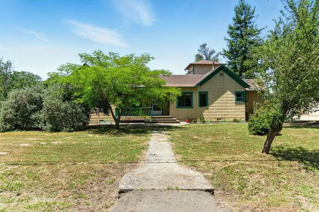 a view of backyard with green space