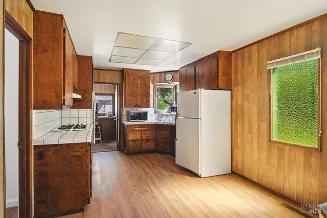 a view of a backyard of the house