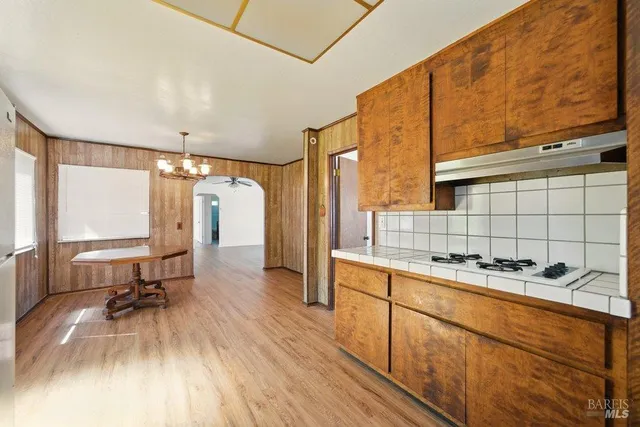 a view of house with swimming pool yard and outdoor seating