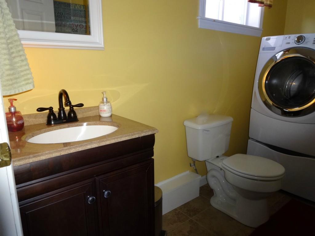 345 Lily Road Dedham, ME 04429 - Photo 17 of 35 Convenient first floor half bath