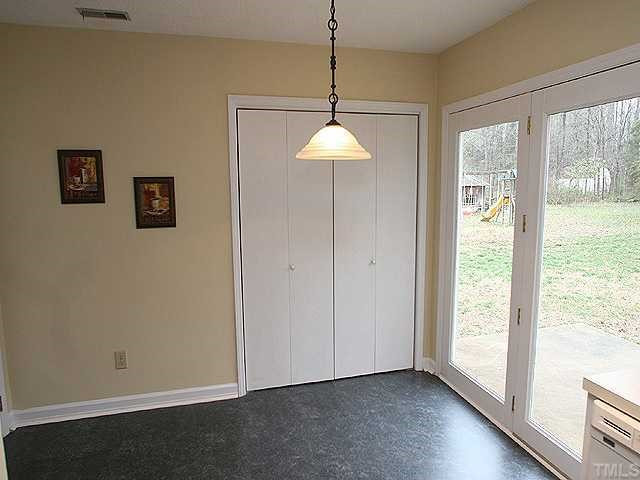 2813 Duke Homestead Road Durham, NC 27705 - Photo 5 of 6 Enjoy morning coffee and a newspaper in this sunny breakfast room! Breakfast Area