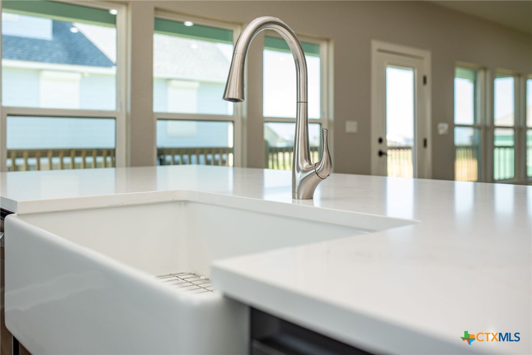 116 Whooping Crane Street Port O'Connor, TX 77982 - Photo 26 of 38 a large white tub sitting next to a window