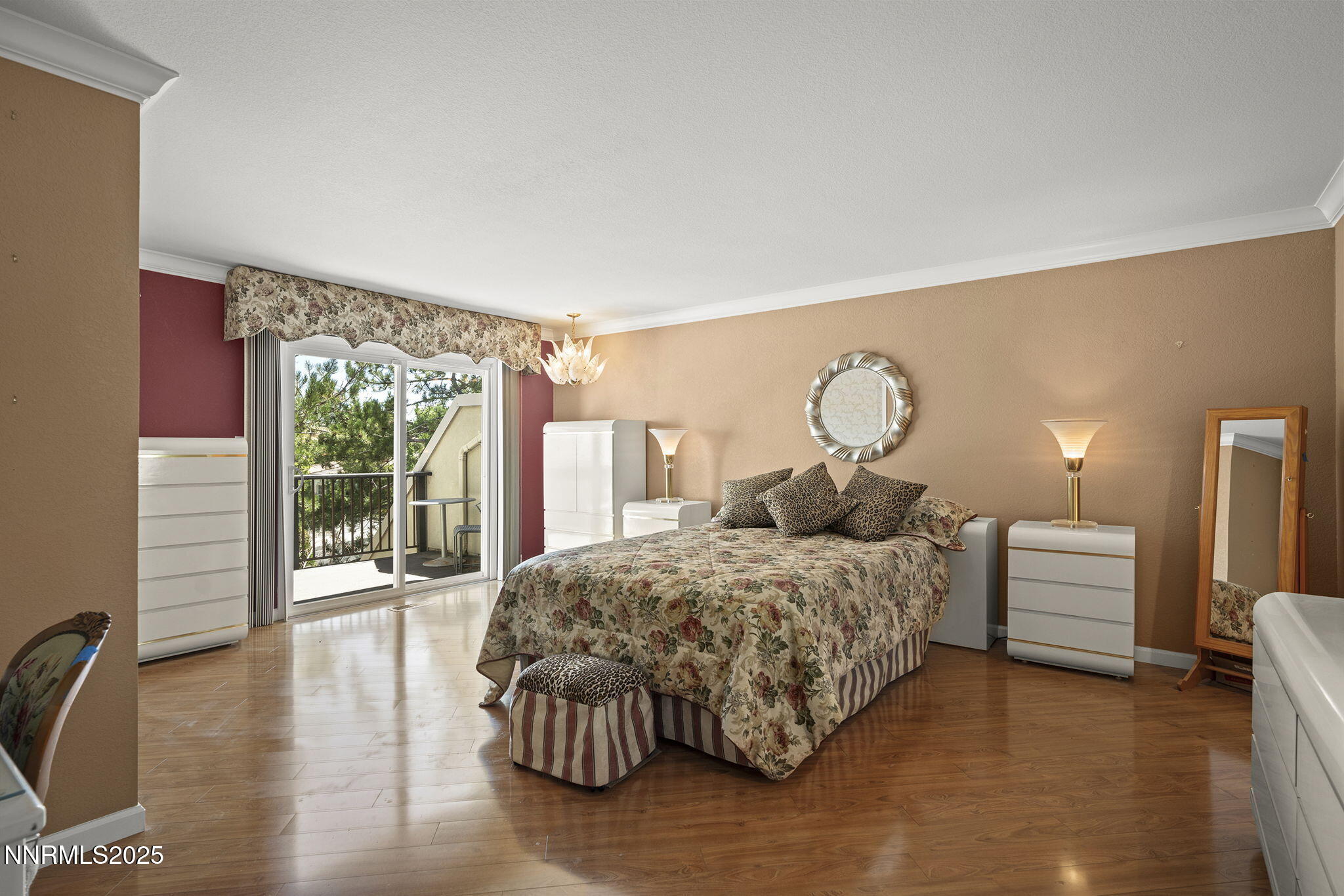 3601 Skyline Boulevard, Unit 34 Reno, NV 89509 - Photo 13 of 26 a bedroom with a bed and large windows