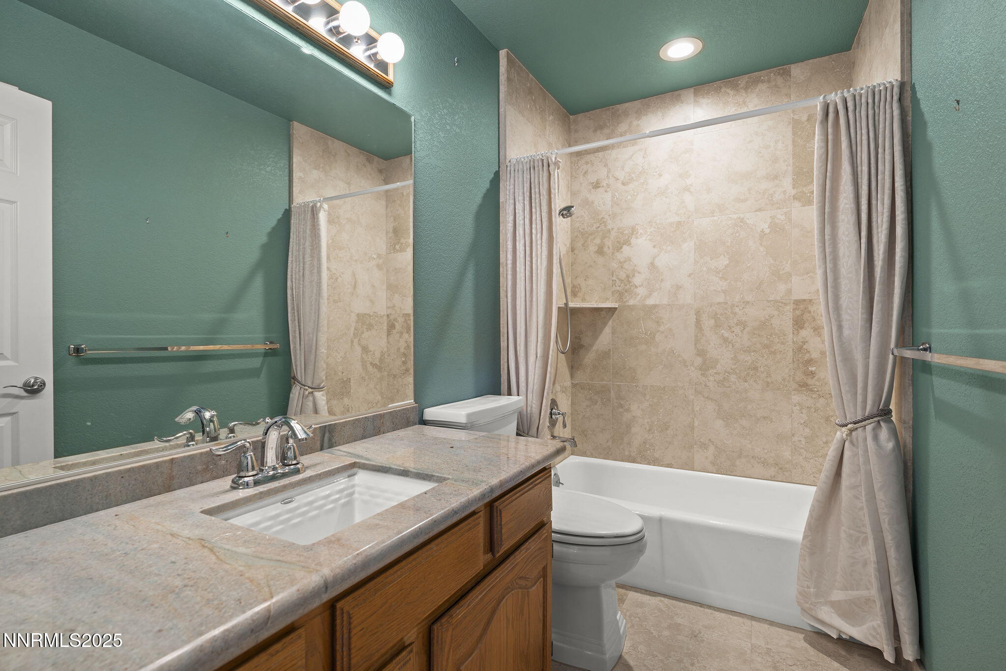 3601 Skyline Boulevard, Unit 34 Reno, NV 89509 - Photo 21 of 26 a bathroom with a granite countertop sink toilet and shower