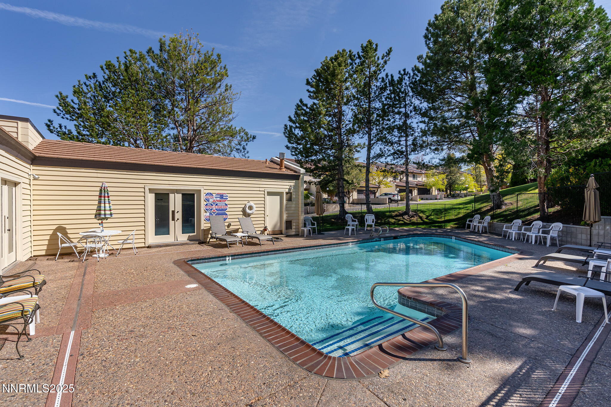 3601 Skyline Boulevard, Unit 34 Reno, NV 89509 - Photo 25 of 26 a view of a house with backyard and sitting area