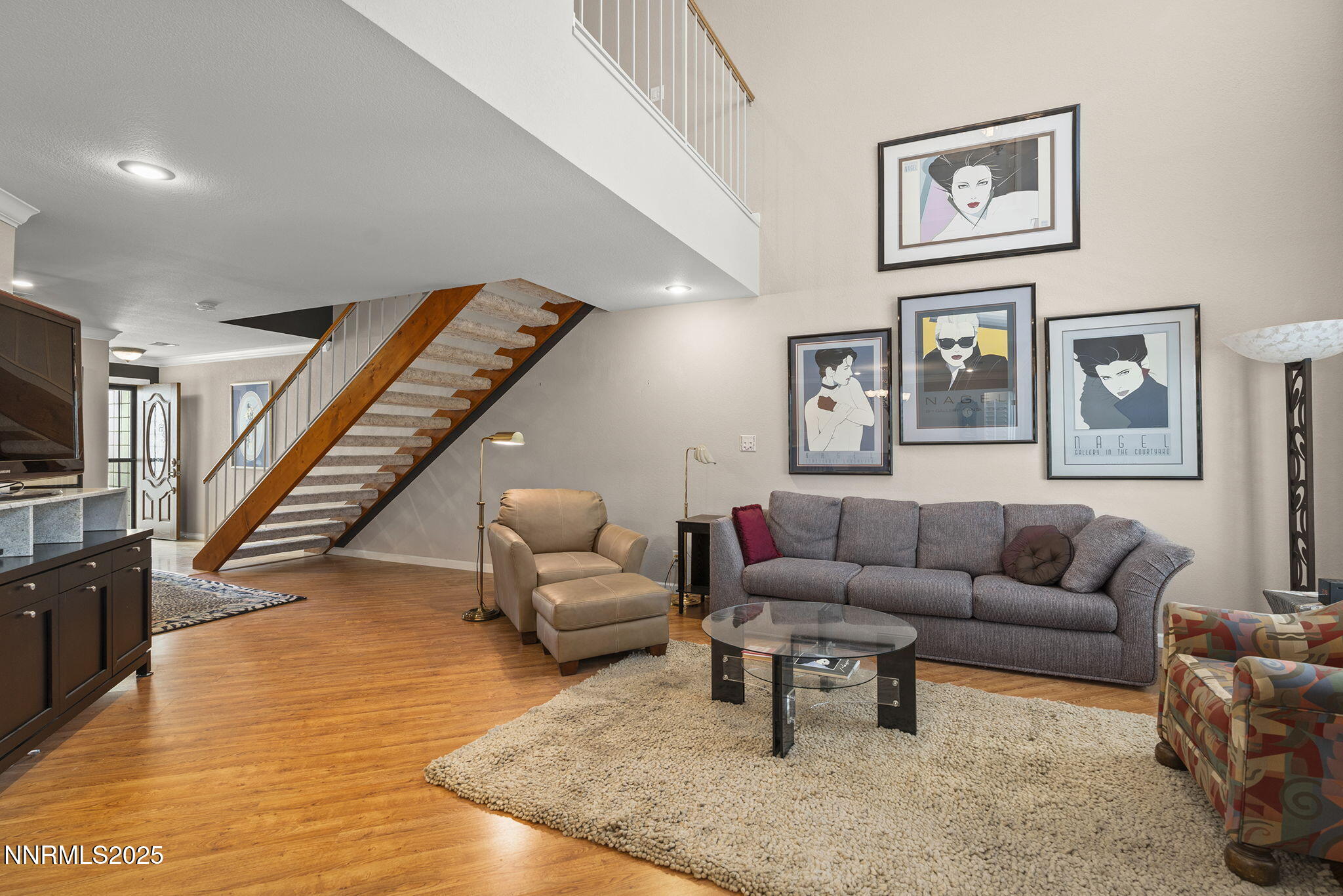 3601 Skyline Boulevard, Unit 34 Reno, NV 89509 - Photo 6 of 26 a living room with furniture and wooden floor