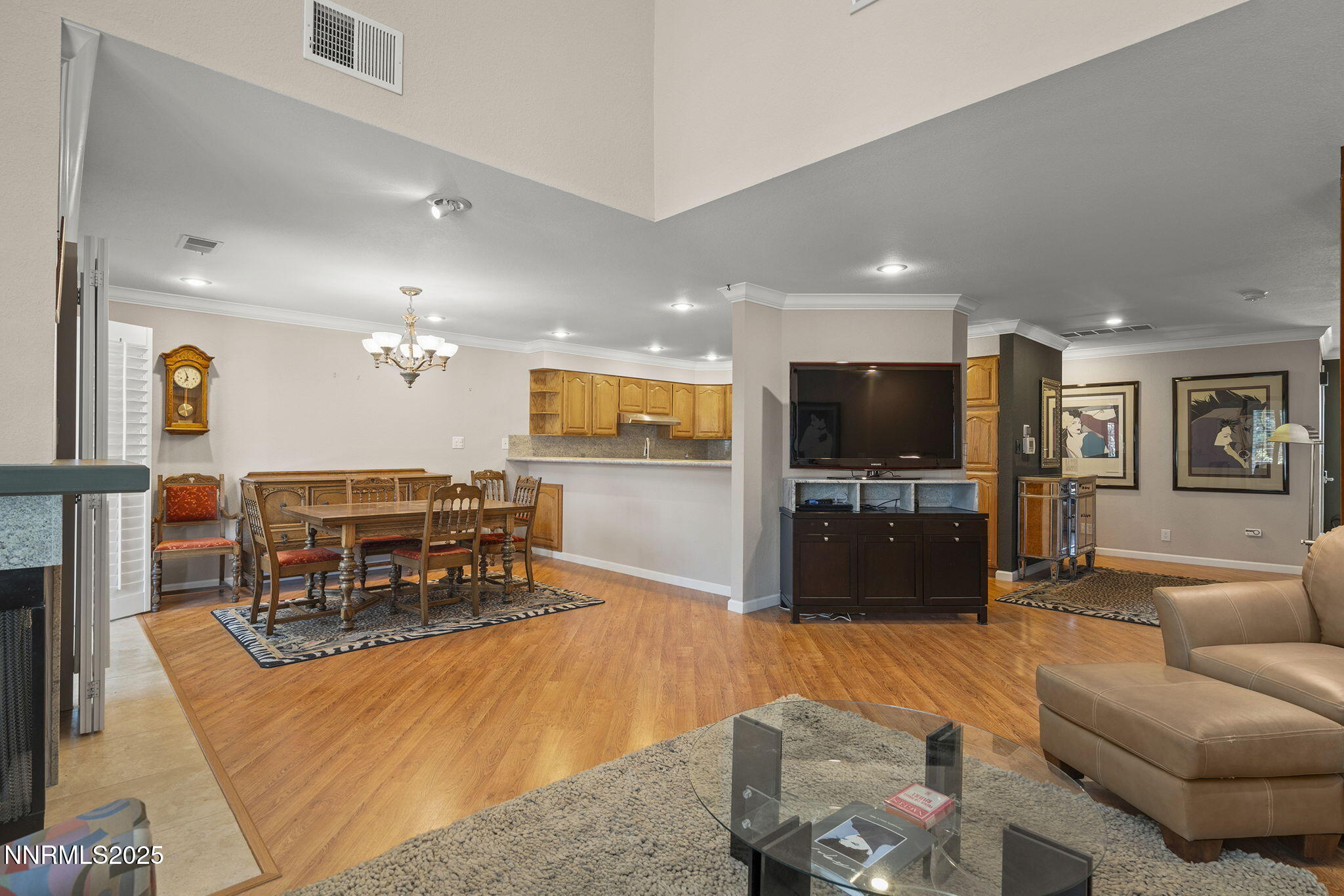 3601 Skyline Boulevard, Unit 34 Reno, NV 89509 - Photo 7 of 26 a living room with furniture and a flat screen tv
