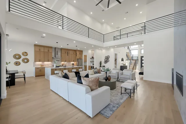 a kitchen with appliances cabinets and furniture