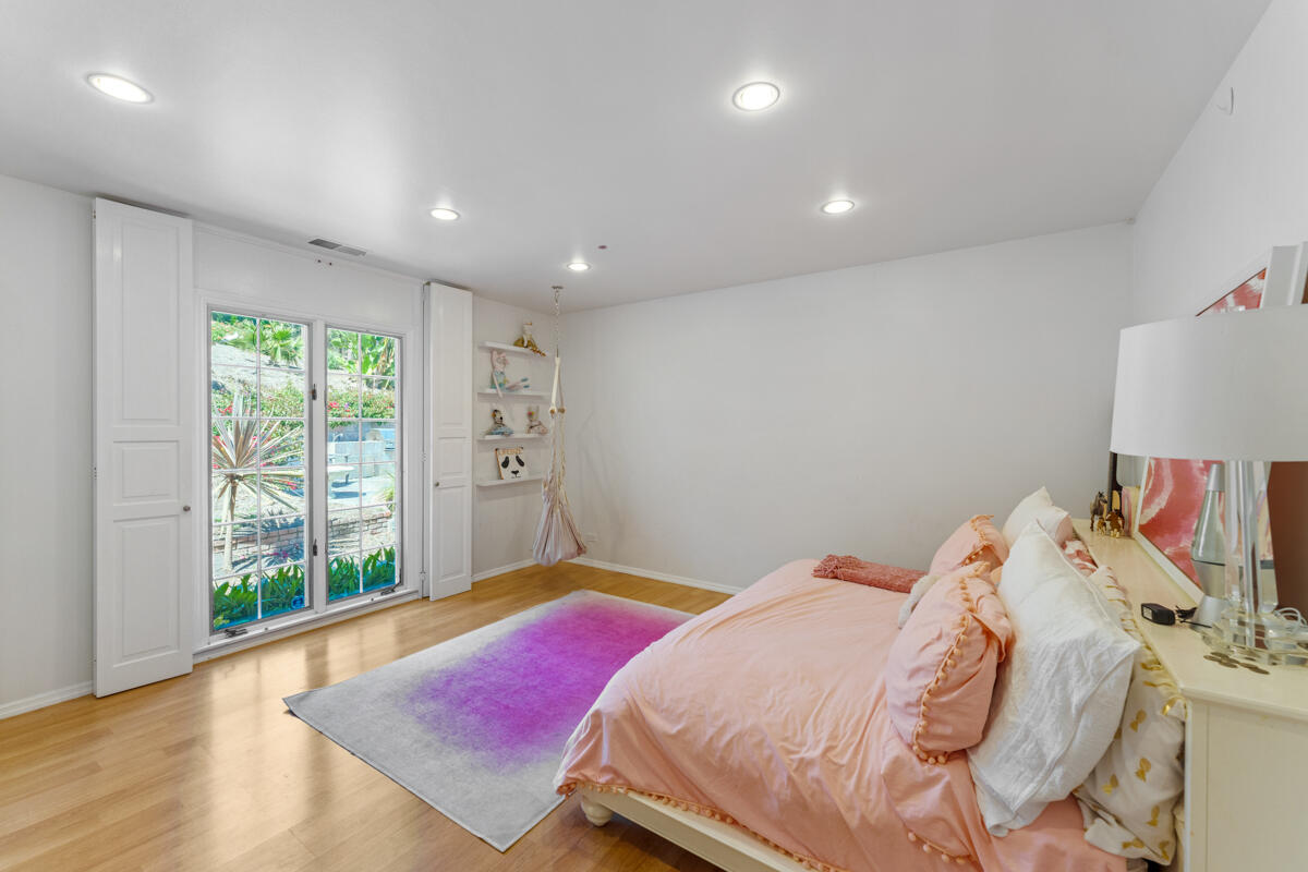 1020 Alston Road Montecito, CA 93108 - Photo 26 of 35 a bedroom with a bed and a large window