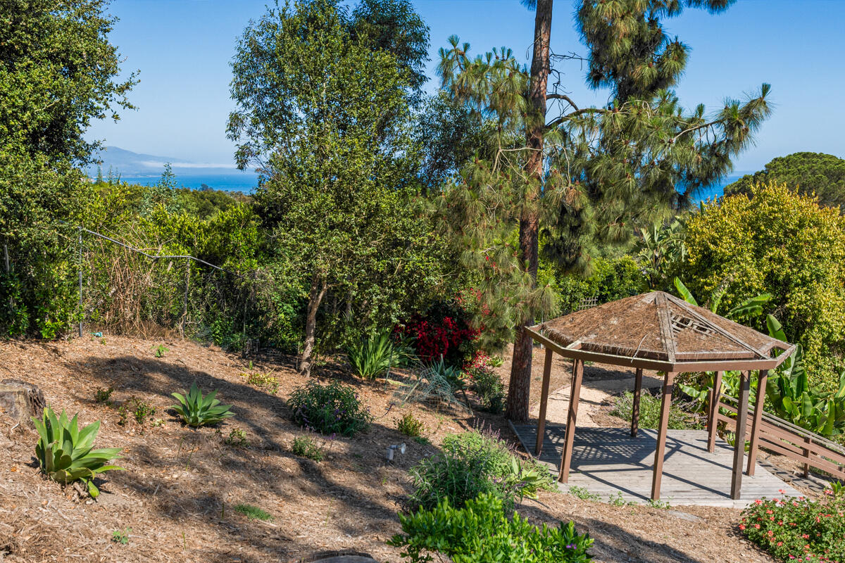 1020 Alston Road Montecito, CA 93108 - Photo 34 of 35 a backyard of a house with table and chairs