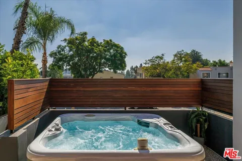 a view of a back yard of the house