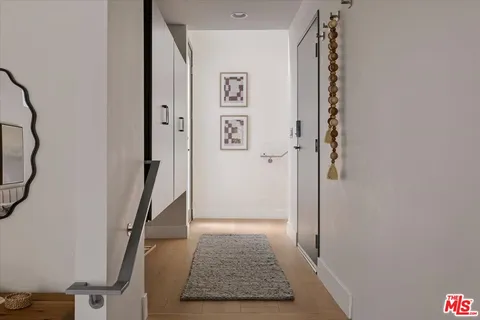 a view of entryway with a rug