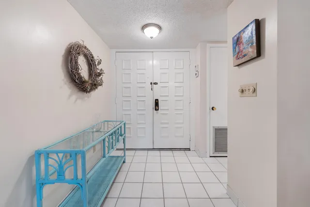 a view of a hallway with entryway