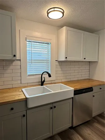 a view of kitchen and utility room