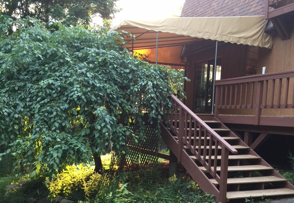 823 Grindstone Road East Millinocket, ME 04460 - Photo 8 of 41 External S side, steps to deck