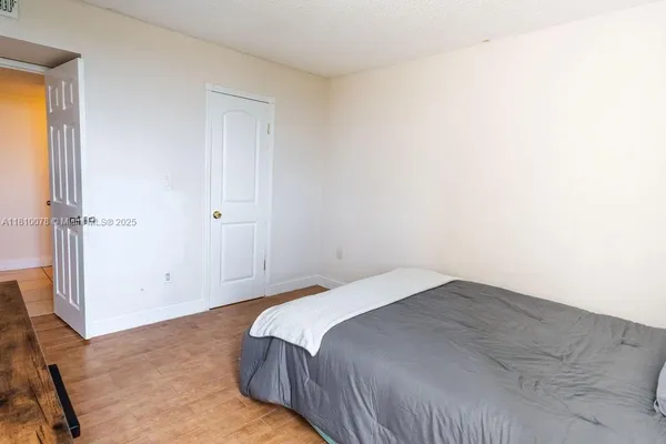 a view of a bathroom from a hallway