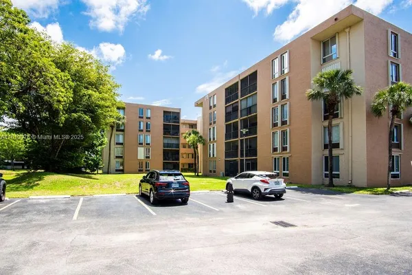 a view of kitchen with furniture and window