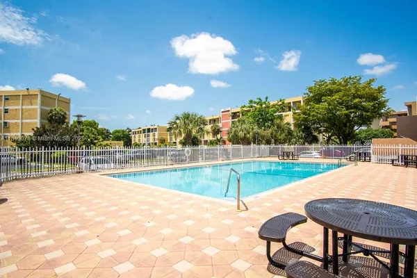 a view of a house with a swimming pool