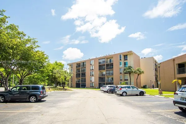 an aerial view of a house with outdoor space