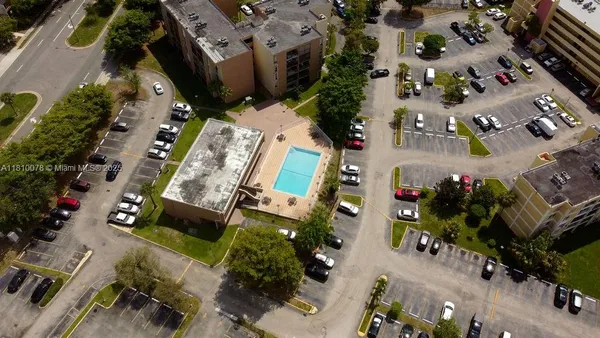 an aerial view of residential building and lake view