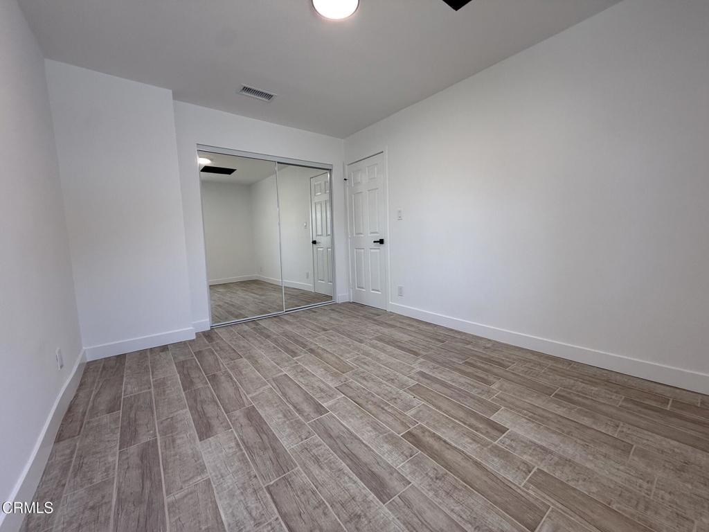 4010 Witt Avenue Riverside, CA 92501 - Photo 13 of 23 a view of an empty room and wooden floor