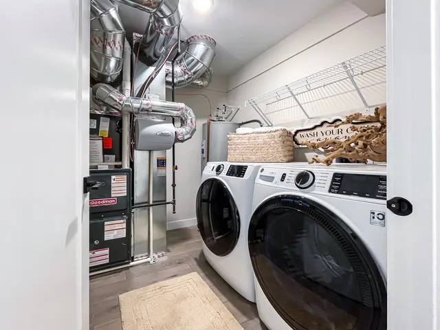 a view of washer and dryer in a utility room