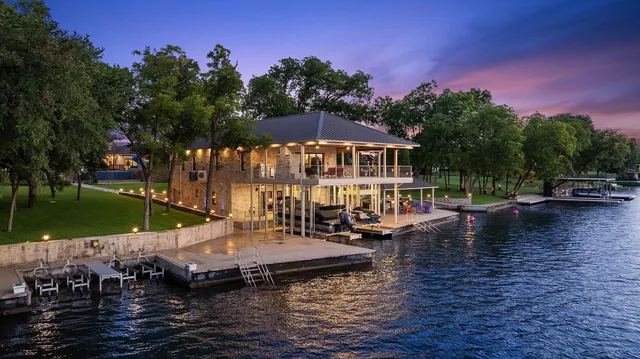 a group of chairs sitting in patio of a house